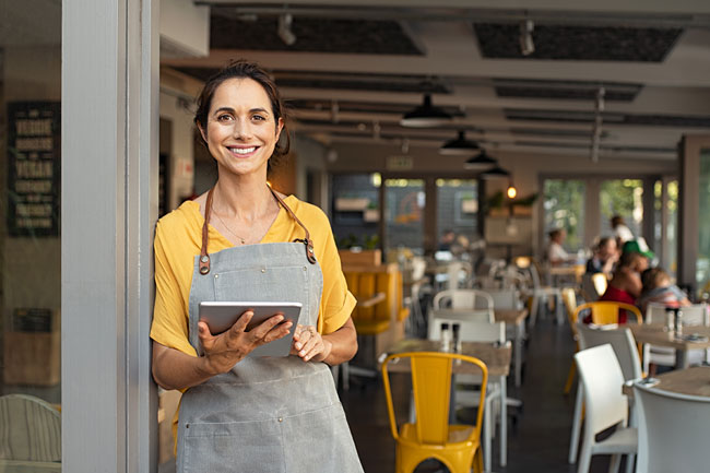 Business Owner using Tablet